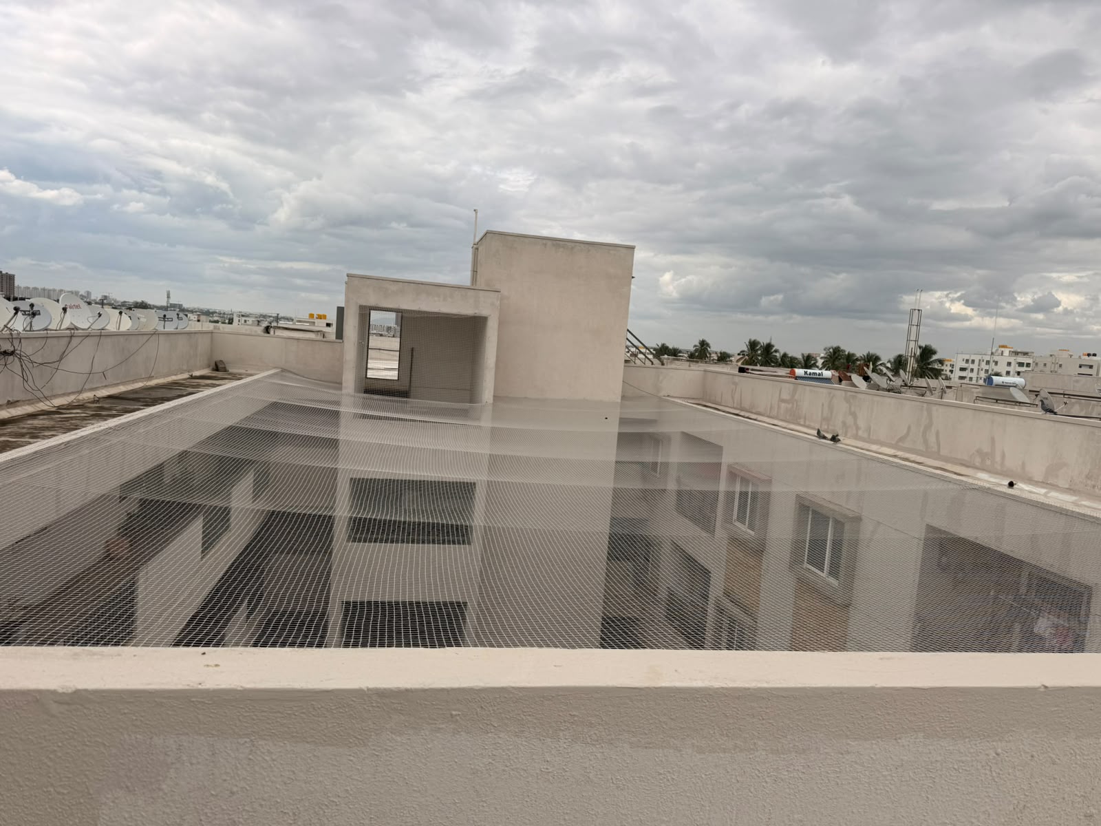 Terrace top safety net covering an open Bengaluru rooftop