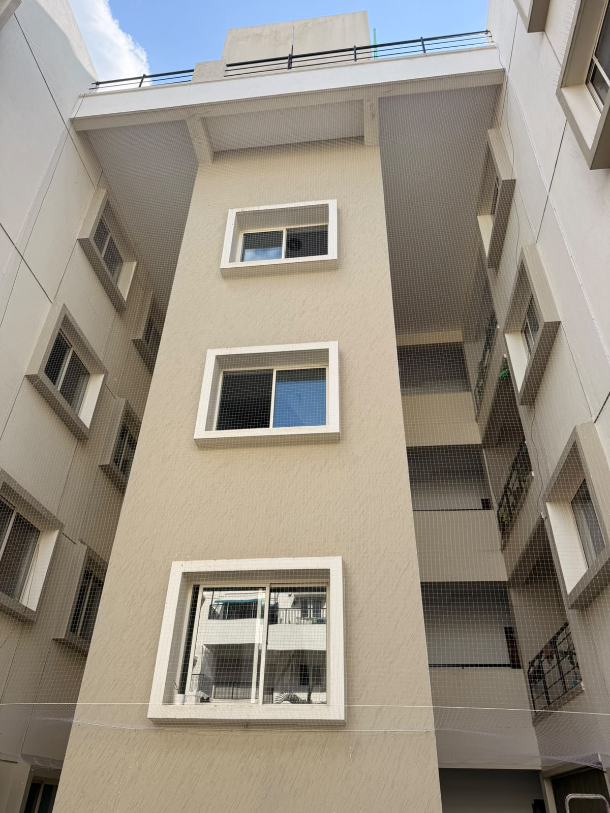 High-rise building safety net fitted along the facade in Bengaluru